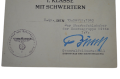 A War Merit Cross First Class with Swords and Paper Award signed Generalfeldmarschall Ernst Busch.