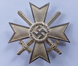 A War Merit Cross First Class with Swords marked 1 maker Deschler & Sohn, München.