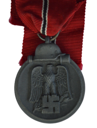 A 1941 - 42 EAST MEDAL MARKED 7 BY maker Paul Meybauer, Berlin.