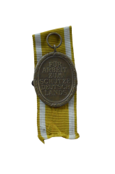 A West Wall Campaign Medal with enwelope maker Carl Poellath, Schrobenhausen.