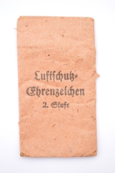 A Air Raid Defence “Luftschutz” Medal Scond Class marked 60 maker Katz & Deyhle in bag.