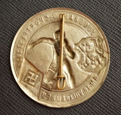 A 1936 HJ Shot Put Sportsfest Tinnie.