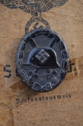 Germany, Heer. A Set Kurland Cuff Title, Iron Cross Second Class, Wound Badge With Recipient Soldbuch and Wehrpass