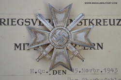 A War Merit Cross First Class with Swords and Paper Award signed Generalfeldmarschall Ernst Busch.