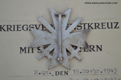 A War Merit Cross First Class with Swords and Paper Award signed Generalfeldmarschall Ernst Busch.