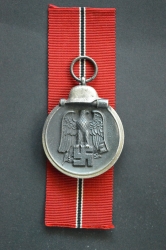 A 1941 - 42 EAST MEDAL UNMARKED.