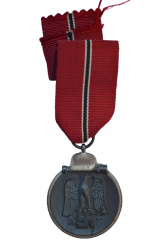 A 1941 - 42 EAST MEDAL MARKED 110 BY maker Otto Zappe, Gablonz.