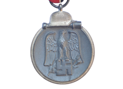 A 1941 - 42 EAST MEDAL MARKED 110 BY maker Otto Zappe, Gablonz.
