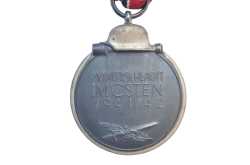 A 1941 - 42 EAST MEDAL MARKED 110 BY maker Otto Zappe, Gablonz.