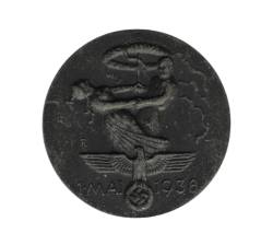 A 1934 National Day of Labour Badge maker marked.