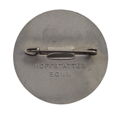 A 1936 National Day of Labour Badge maker marked.