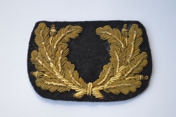 A Kriegsmarine Officer’s Bullion Visor Cap Wreath