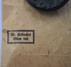 WOUND BADGE BLACK GRADE, MAGNETIC IN ENVELOPE MARKED WILHELM HOBACHER, WIEN.