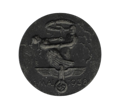 A 1934 National Day of Labour Badge maker marked.
