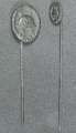 Set Wound Badge Black stickpins, one marked L/18 