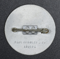 A 1938 National Day of Labour Badge maker marked Paul Schultze & Co..