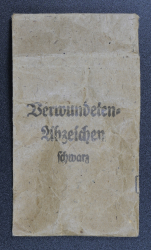 WOUND BADGE BLACK GRADE, MAGNETIC IN ENVELOPE MARKED Rudolf A. Karneth & Sohne, Gablonz a.N.