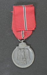 A 1941 - 42 EAST MEDAL UNMARKED.