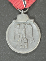 A 1941 - 42 EAST MEDAL UNMARKED.