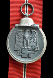 A 1941 - 42 EAST MEDAL UNMARKED.