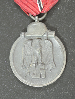 A 1941 - 42 EAST MEDAL UNMARKED.