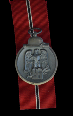 A 1941 - 42 EAST MEDAL MARKED 110 BY maker Otto Zappe, Gablonz.